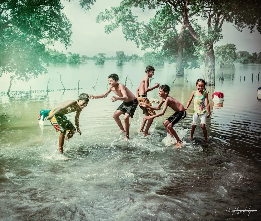 Local children playing in the floods
